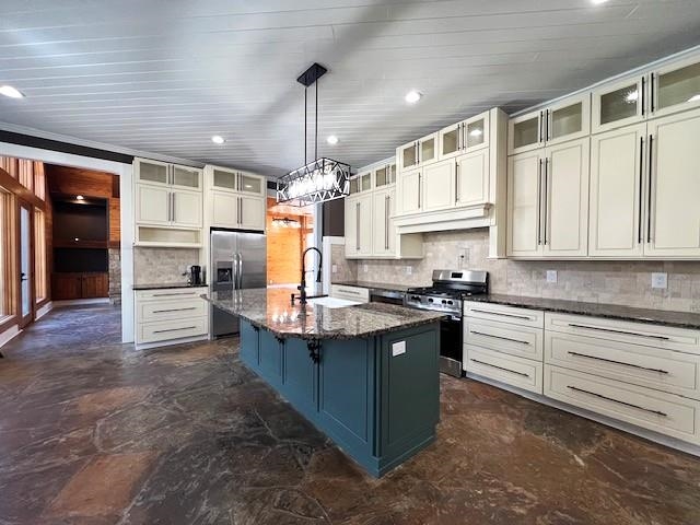 9490 Highway 196 Collierville, TN 38017 - Photo 14 of 40 Kitchen with stainless steel appliances, dark stone counters, glass insert cabinets, backsplash, and dual tone cabinets