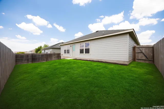 a view of a backyard with a garden