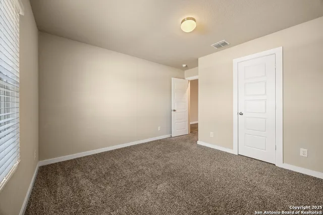 an empty room with an entryway