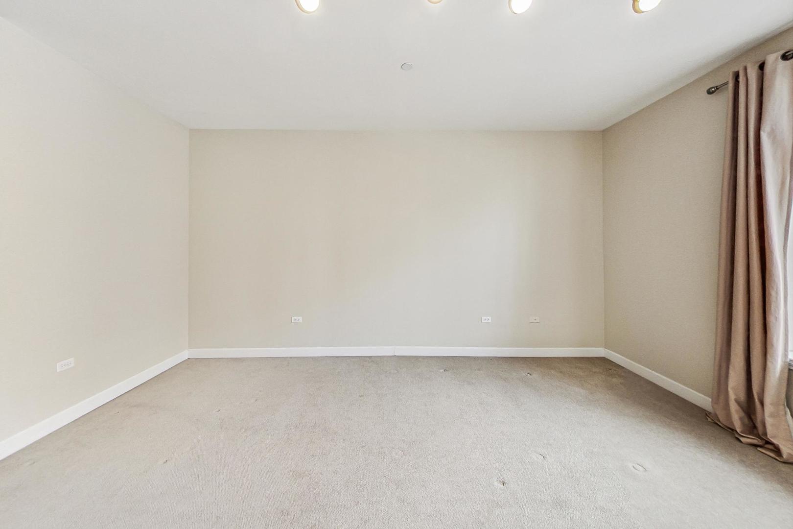 50 North Plum Grove Road, Unit 210E Palatine, IL 60067 - Photo 24 of 47 a view of an empty room
