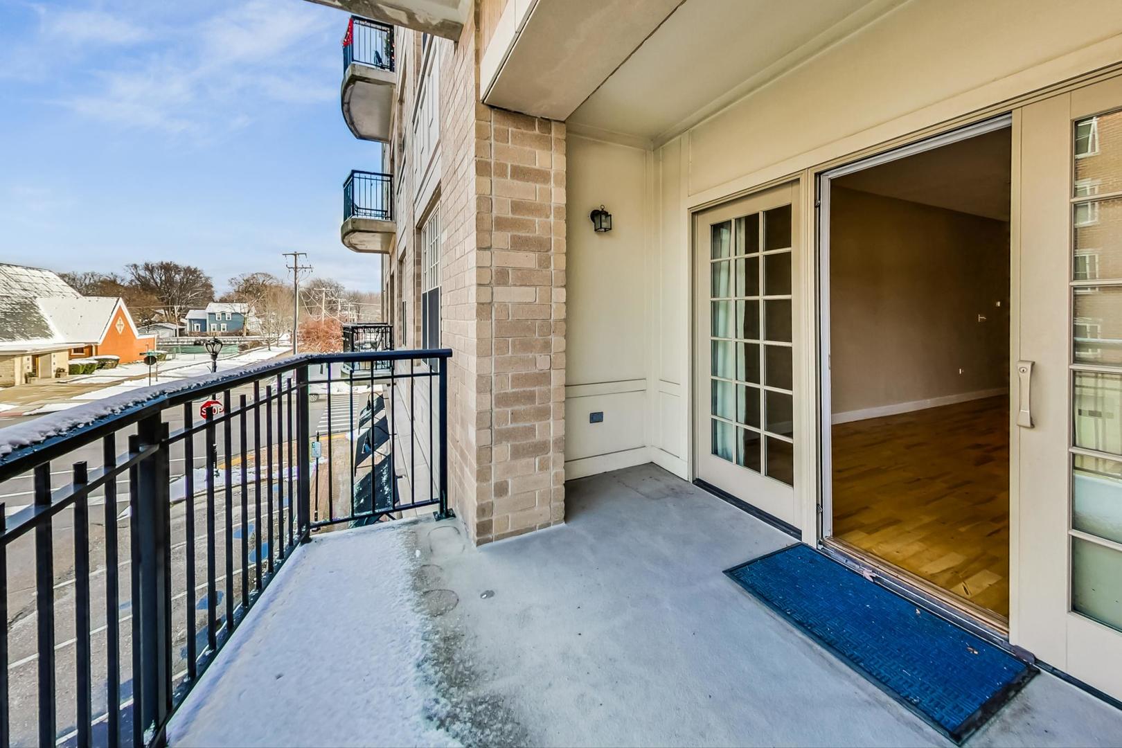 50 North Plum Grove Road, Unit 210E Palatine, IL 60067 - Photo 36 of 47 a view of a balcony from door