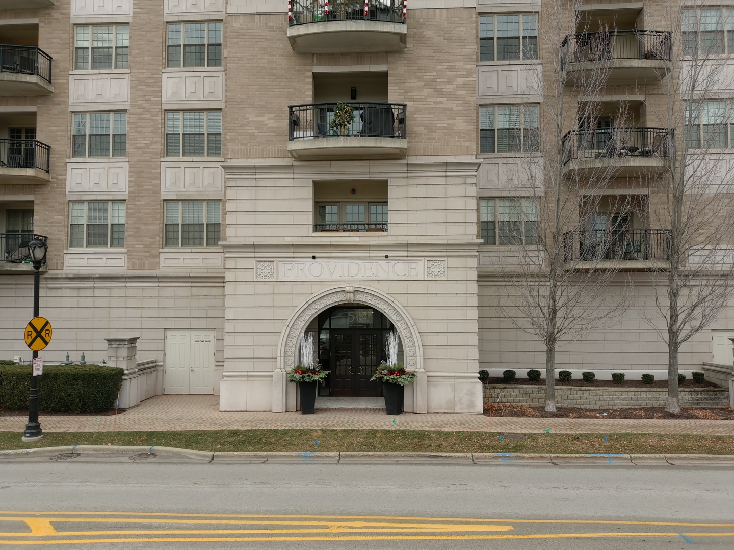 50 North Plum Grove Road, Unit 210E Palatine, IL 60067 - Photo 6 of 47 a view of a brick building with entryway