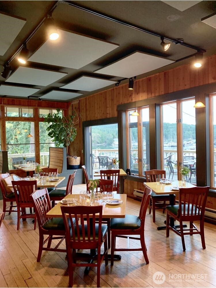 4362 Crow Valley Road Orcas Island, WA 98245 - Photo 11 of 24 a view of a dining room with furniture window and outside view