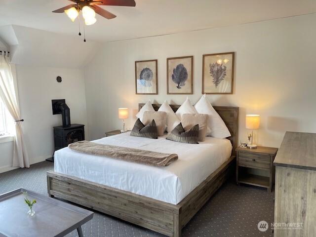 4362 Crow Valley Road Orcas Island, WA 98245 - Photo 16 of 24 a bedroom with bed and window