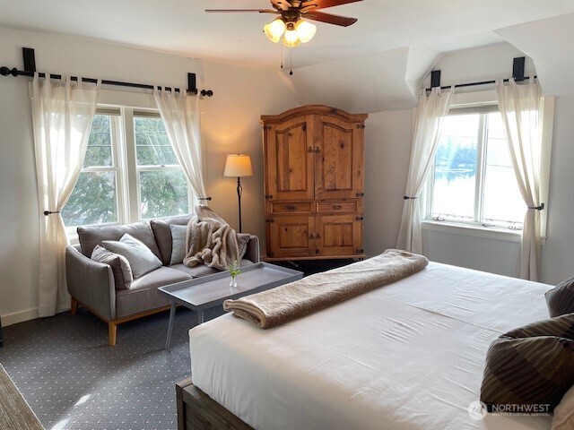 4362 Crow Valley Road Orcas Island, WA 98245 - Photo 18 of 24 a bedroom with a bed couch and window