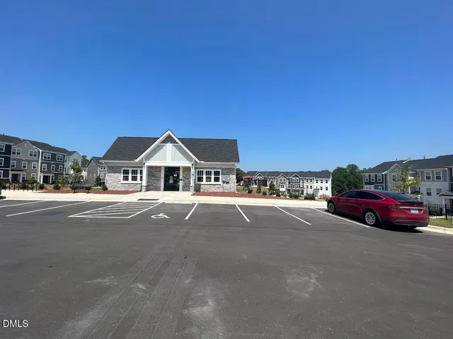 a view of street with parked cars