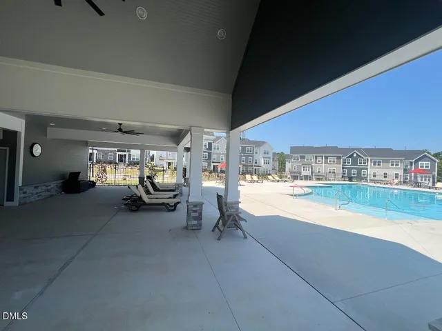 a room with lots of table and chairs