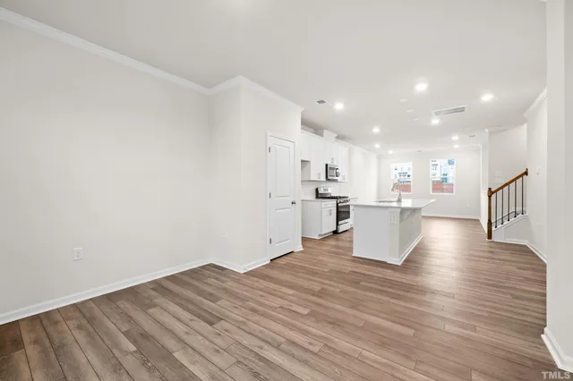 a view of kitchen with wooden floor
