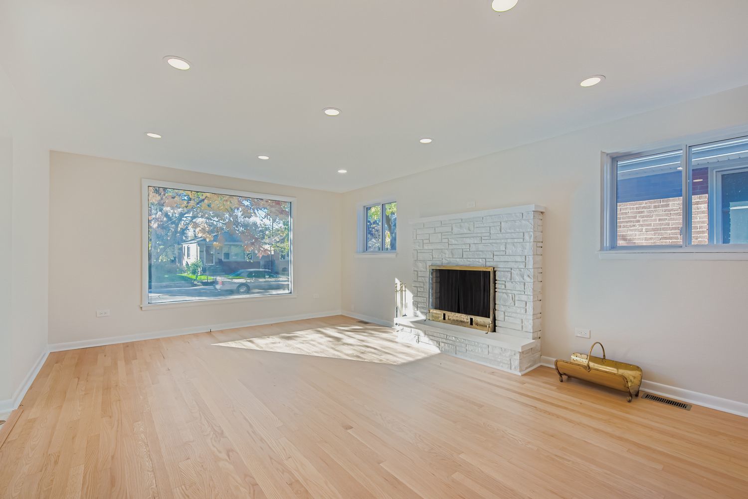 3600 West 115th Street Chicago, IL 60655 - Photo 2 of 17 a view of a livingroom with a fireplace and window