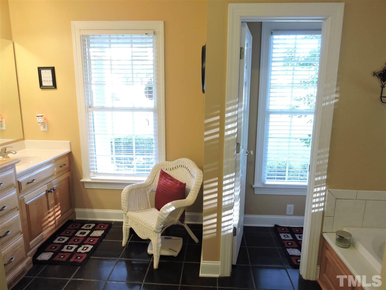 170 Fletcher Ridge Road Timberlake, NC 27583 - Photo 16 of 25 a living room with furniture and a window