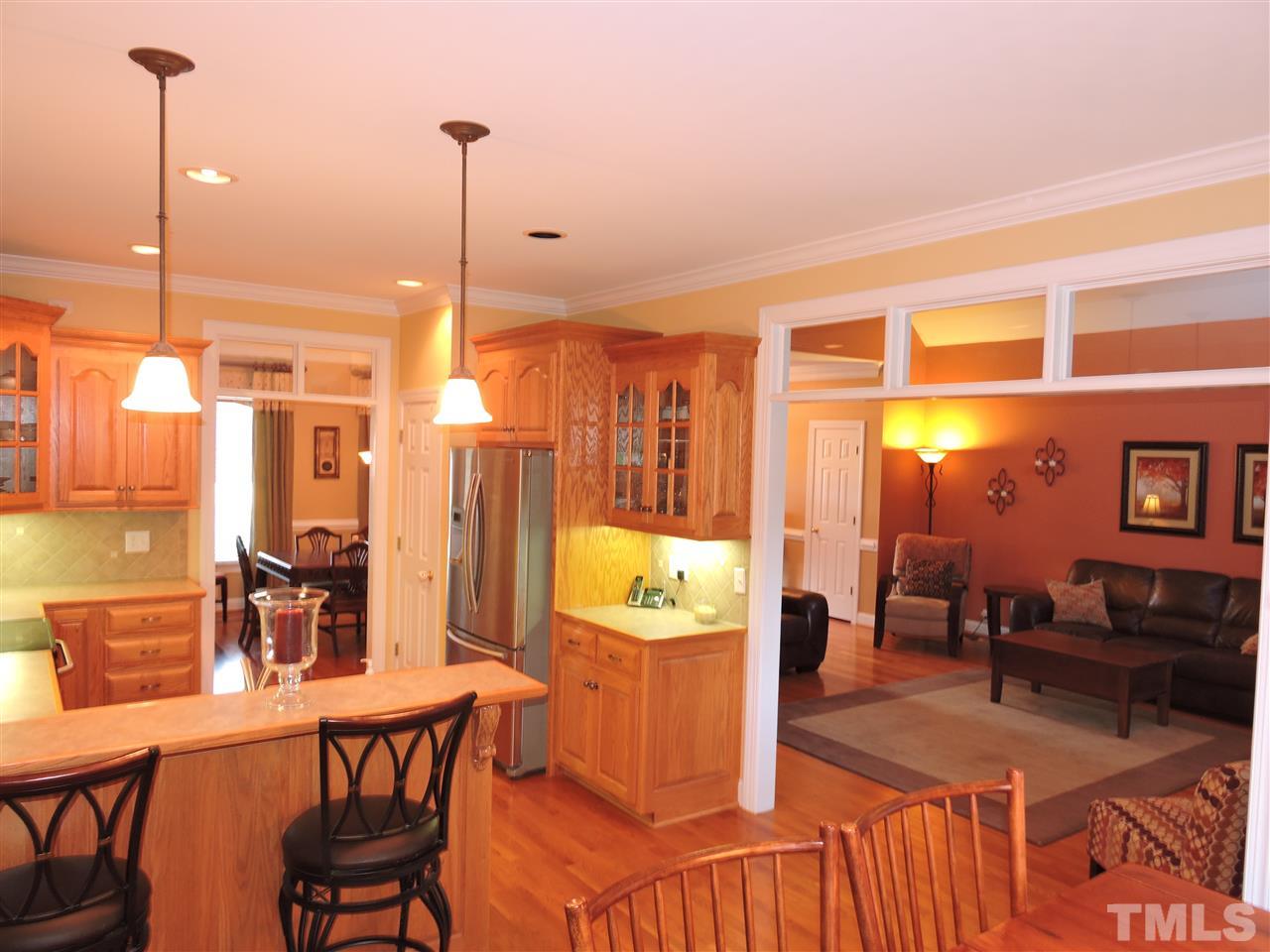 170 Fletcher Ridge Road Timberlake, NC 27583 - Photo 3 of 25 a view of a dining room with furniture window and wooden floor