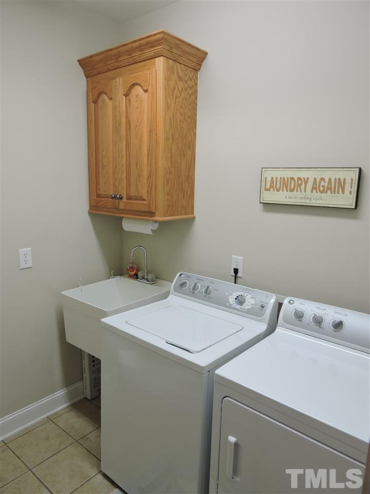 170 Fletcher Ridge Road Timberlake, NC 27583 - Photo 22 of 25 a utility room with dryer and washer
