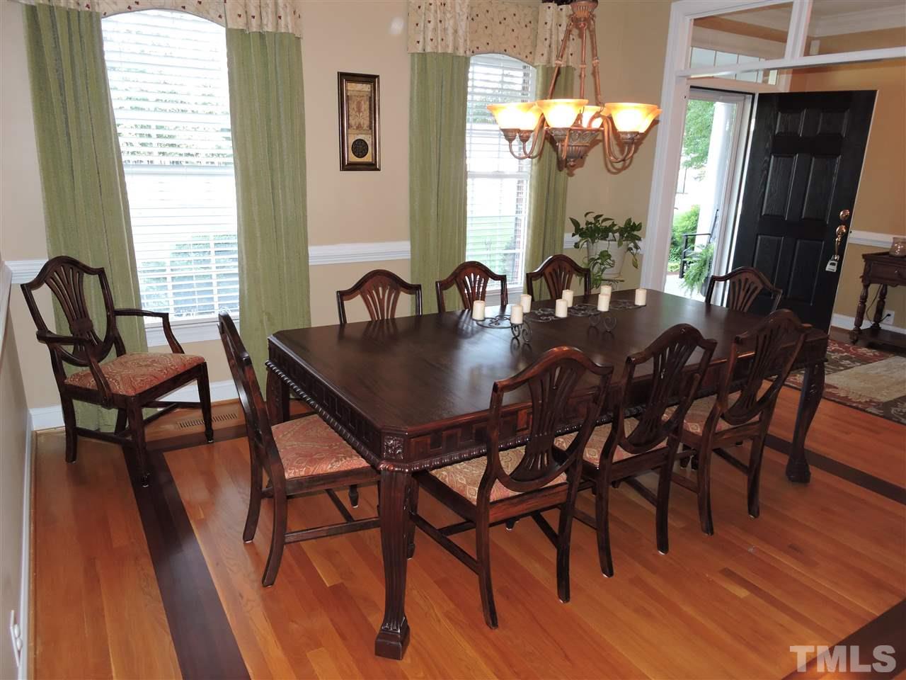 170 Fletcher Ridge Road Timberlake, NC 27583 - Photo 6 of 25 a view of a dining room with furniture and wooden floor