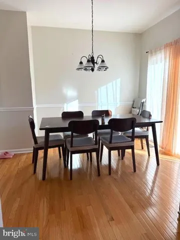 a bathroom with a sink toilet and mirror