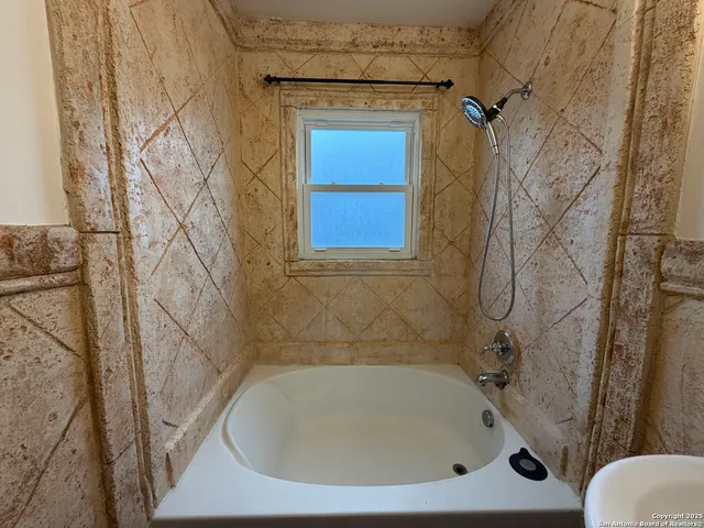 a bathroom with a sink and a toilet