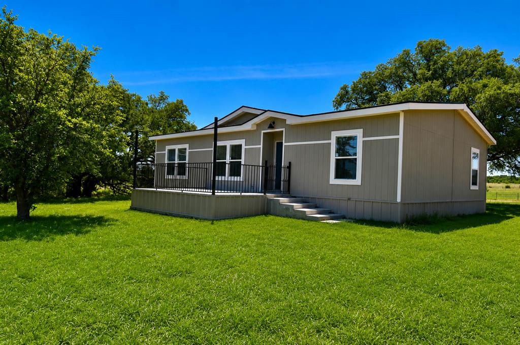 8228 Us Highway Rochelle, TX 76872 - Photo 13 of 36 a front view of house with yard and green space