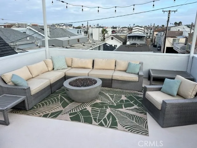 a view of a living room and couches in a patio
