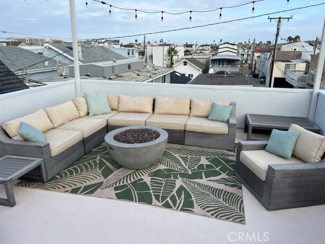 123 36th Street Newport Beach, CA 92663 - Photo 2 of 22 a view of a living room and couches in a patio