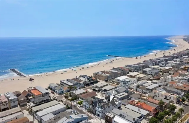 an aerial view of beach and ocean