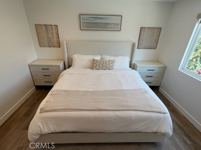 123 36th Street Newport Beach, CA 92663 - Photo 5 of 22 a bedroom with a bed and a couch