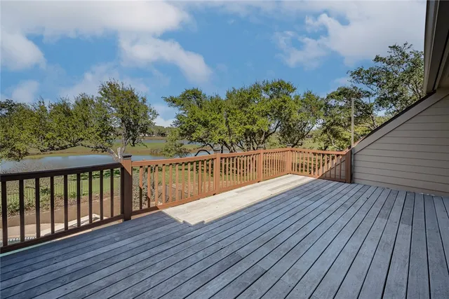 a view of deck with wooden floor and fence