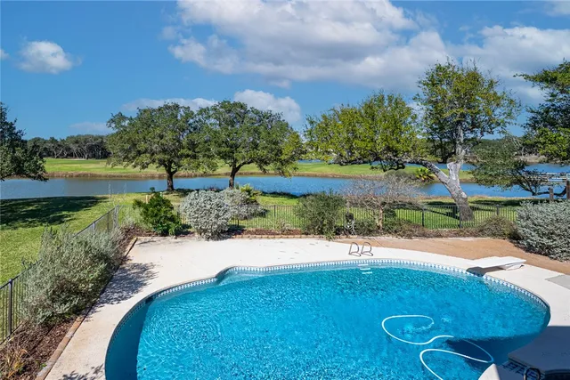 a view of a backyard of the house