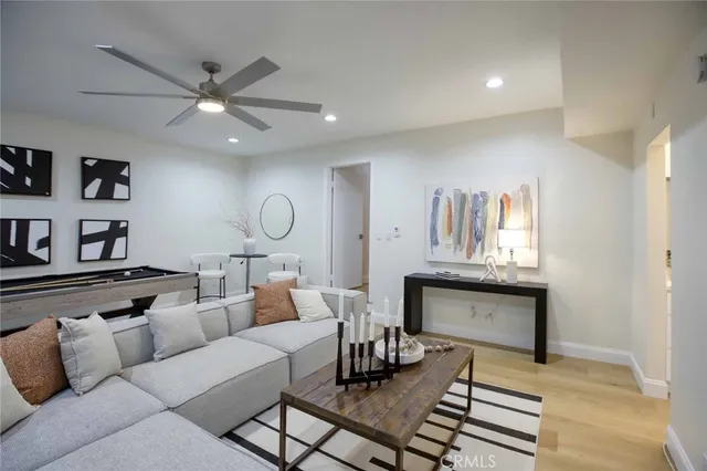 a work room with furniture and a window