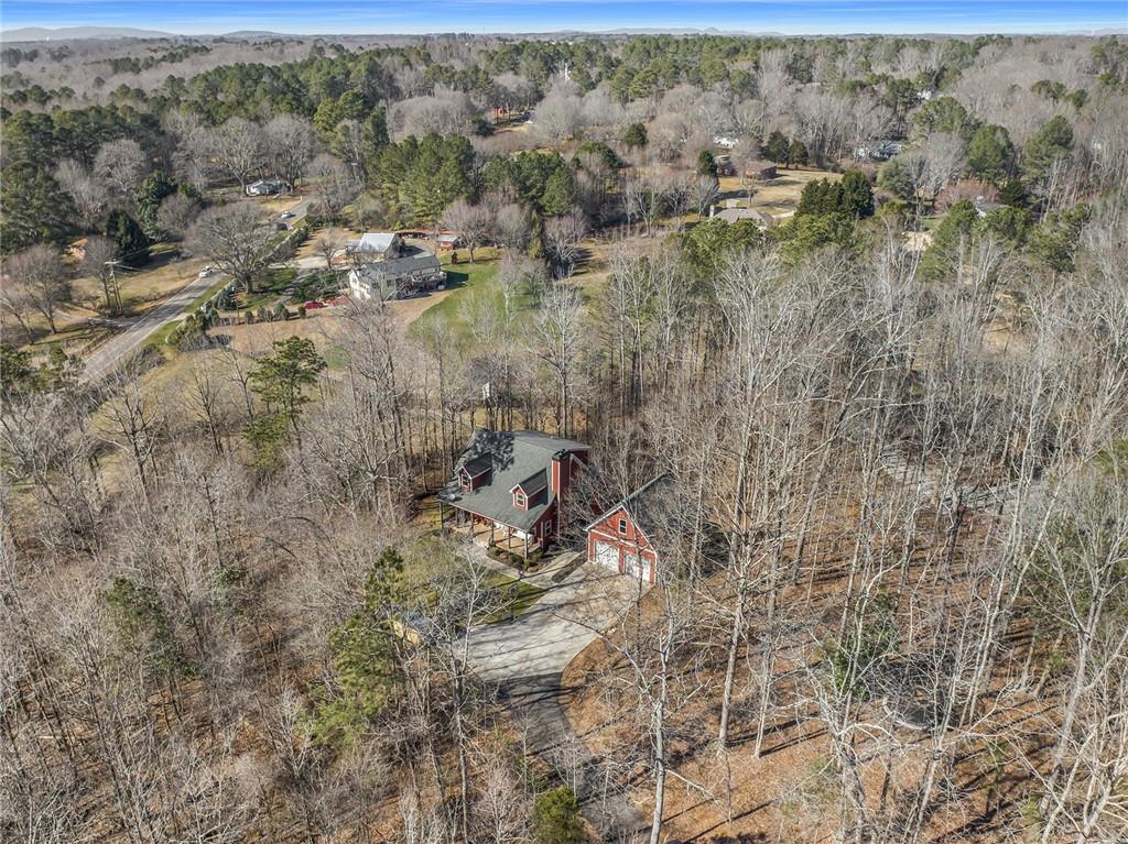 5274 Union Hill Road Canton, GA 30115 - Photo 1 of 1 a view of a dry yard with trees