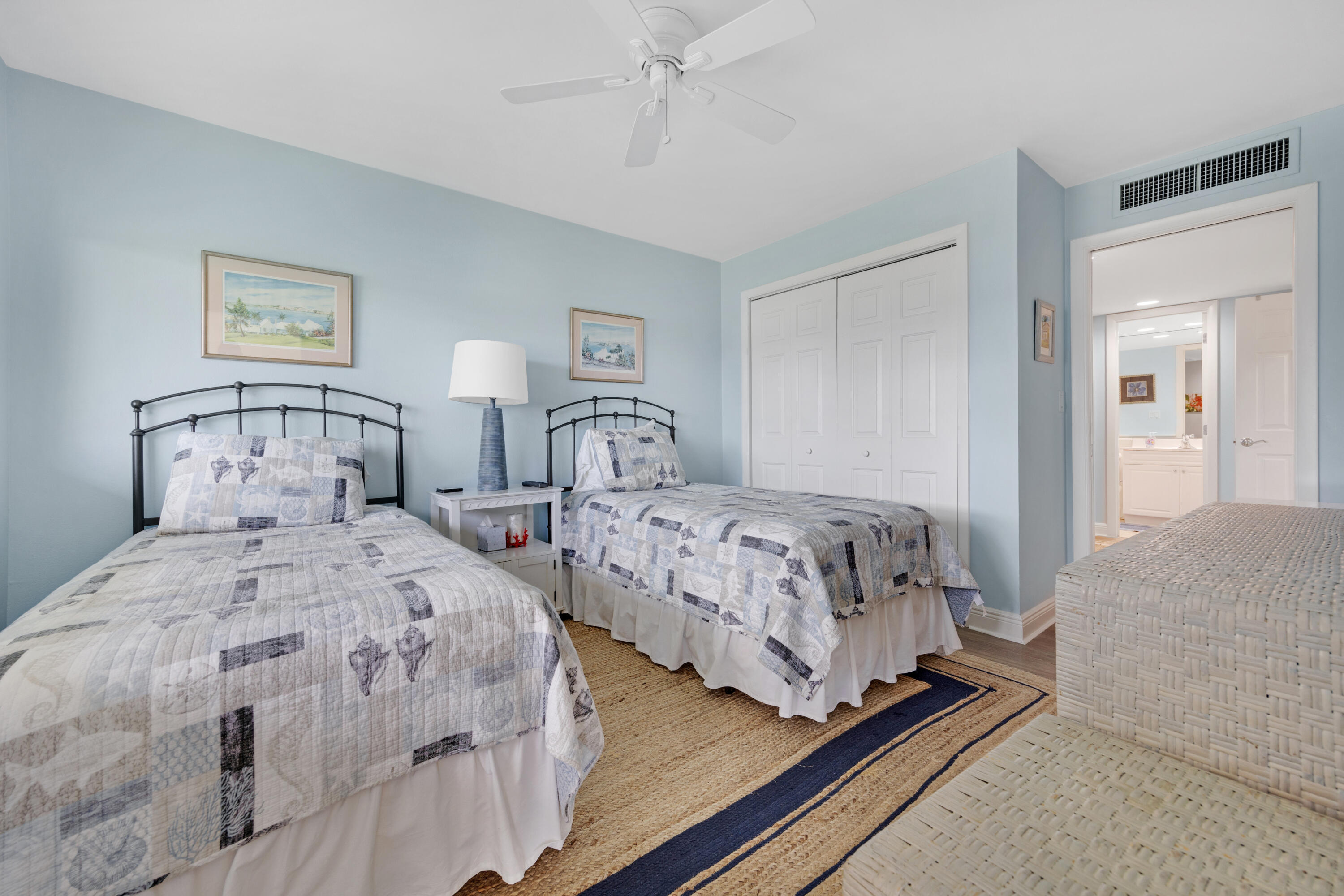 18 Anchor Drive, Unit B Key Largo, FL 33037 - Photo 13 of 17 a bedroom with two beds and painting on the wall