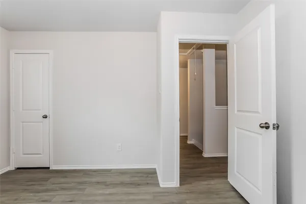 a view of a livingroom with wooden floor