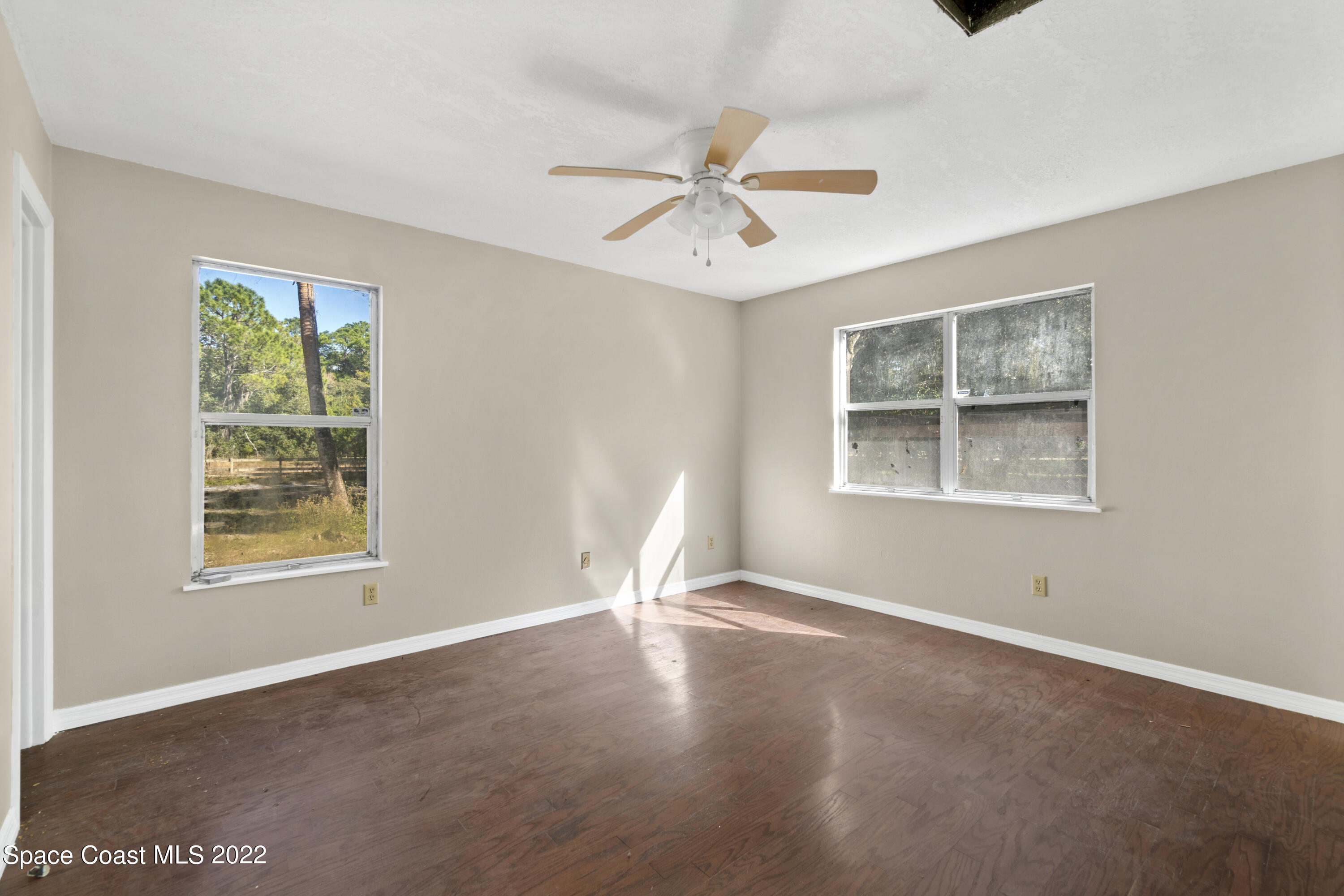 4220 James Road Cocoa, FL 32926 - Photo 27 of 34 a view of an empty room with a window