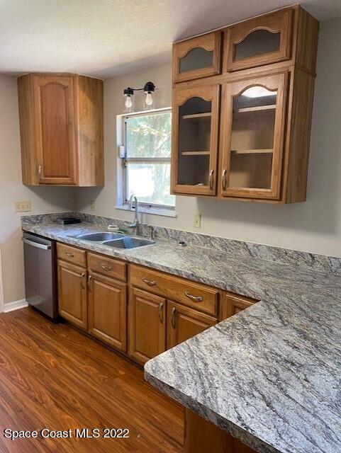 4220 James Road Cocoa, FL 32926 - Photo 5 of 34 a kitchen with granite countertop a sink and cabinets