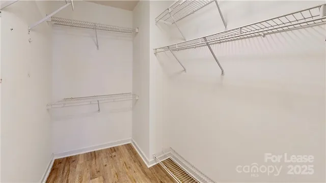 a view of a room with racks on the wall