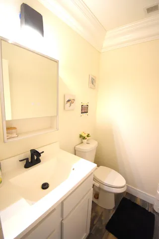 a bathroom with a sink and a toilet