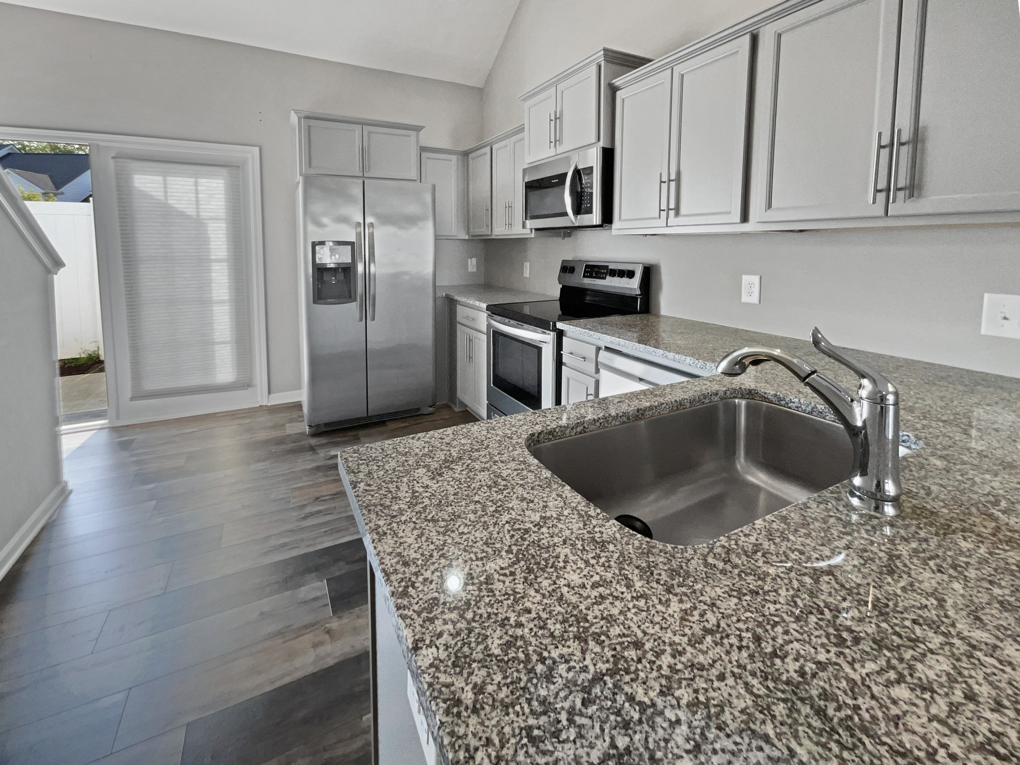 3529 Learning Lane Murfreesboro, TN 37128 - Photo 6 of 22 a kitchen with stainless steel appliances granite countertop a sink a stove a refrigerator and cabinets