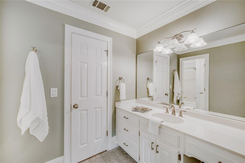 2672 Henderson Ridge Drive Tucker, GA 30084 - Photo 27 of 46 a bathroom with a double vanity sink mirror and