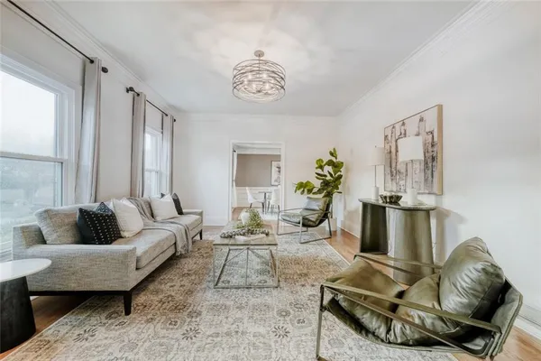 a living room with furniture and a couch