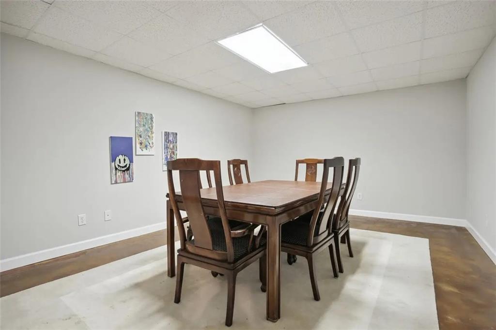 2672 Henderson Ridge Drive Tucker, GA 30084 - Photo 37 of 46 a view of a dining room with furniture and wooden floor