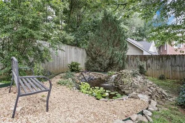 a view of a backyard with a patio