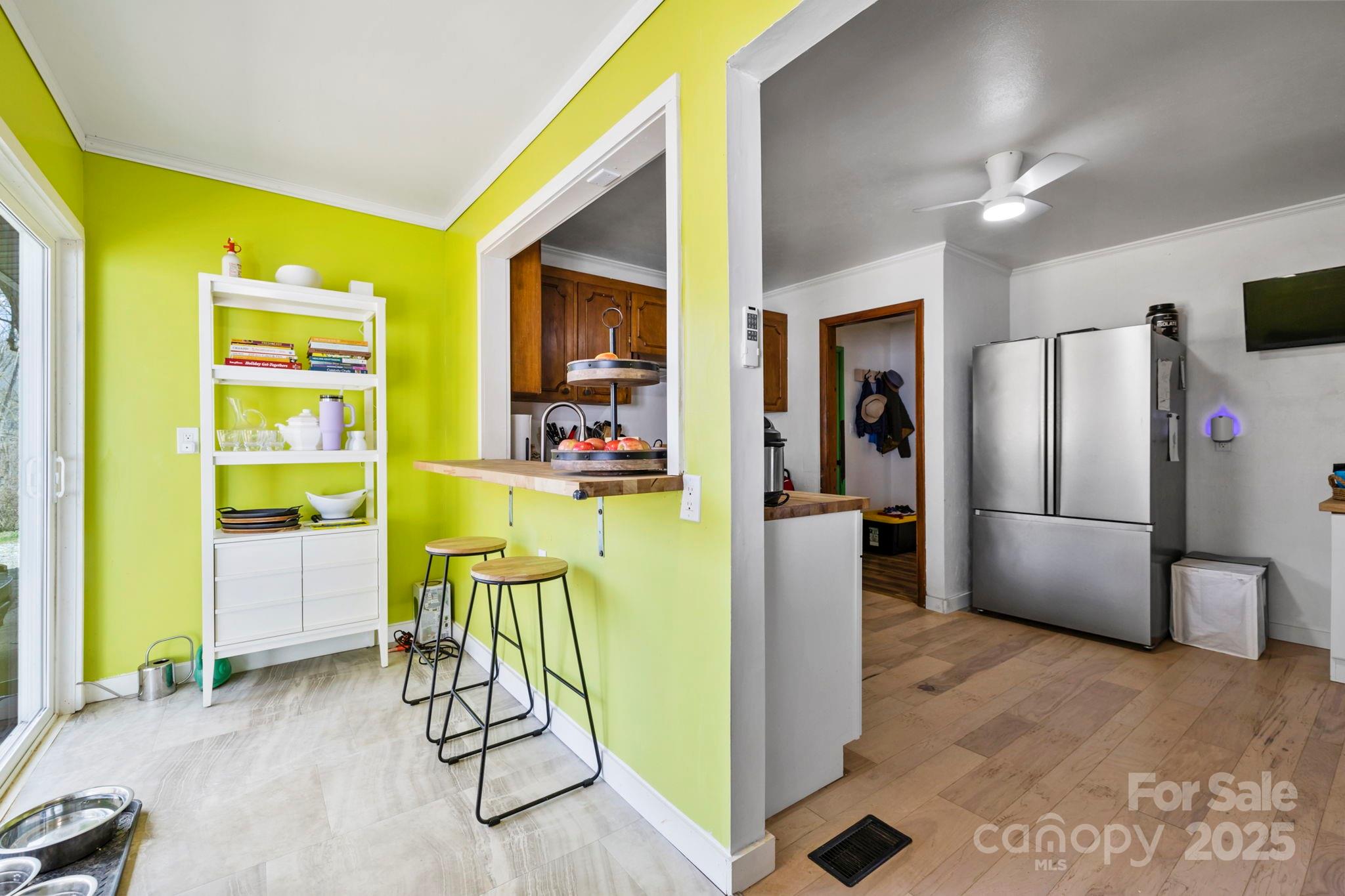 7923 Cruso Road Canton, NC 28716 - Photo 7 of 16 a kitchen with a refrigerator and a sink