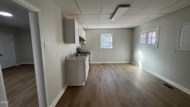 a view of entryway with wooden floor