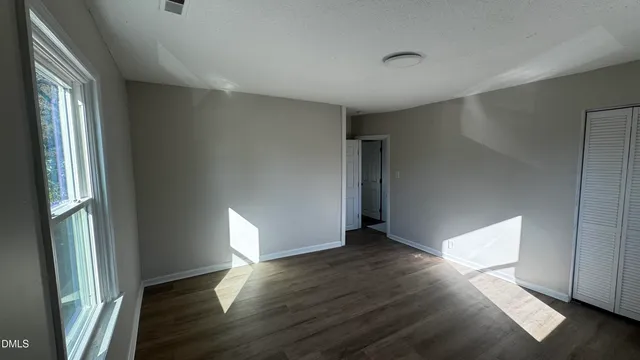 a view of a house with a street