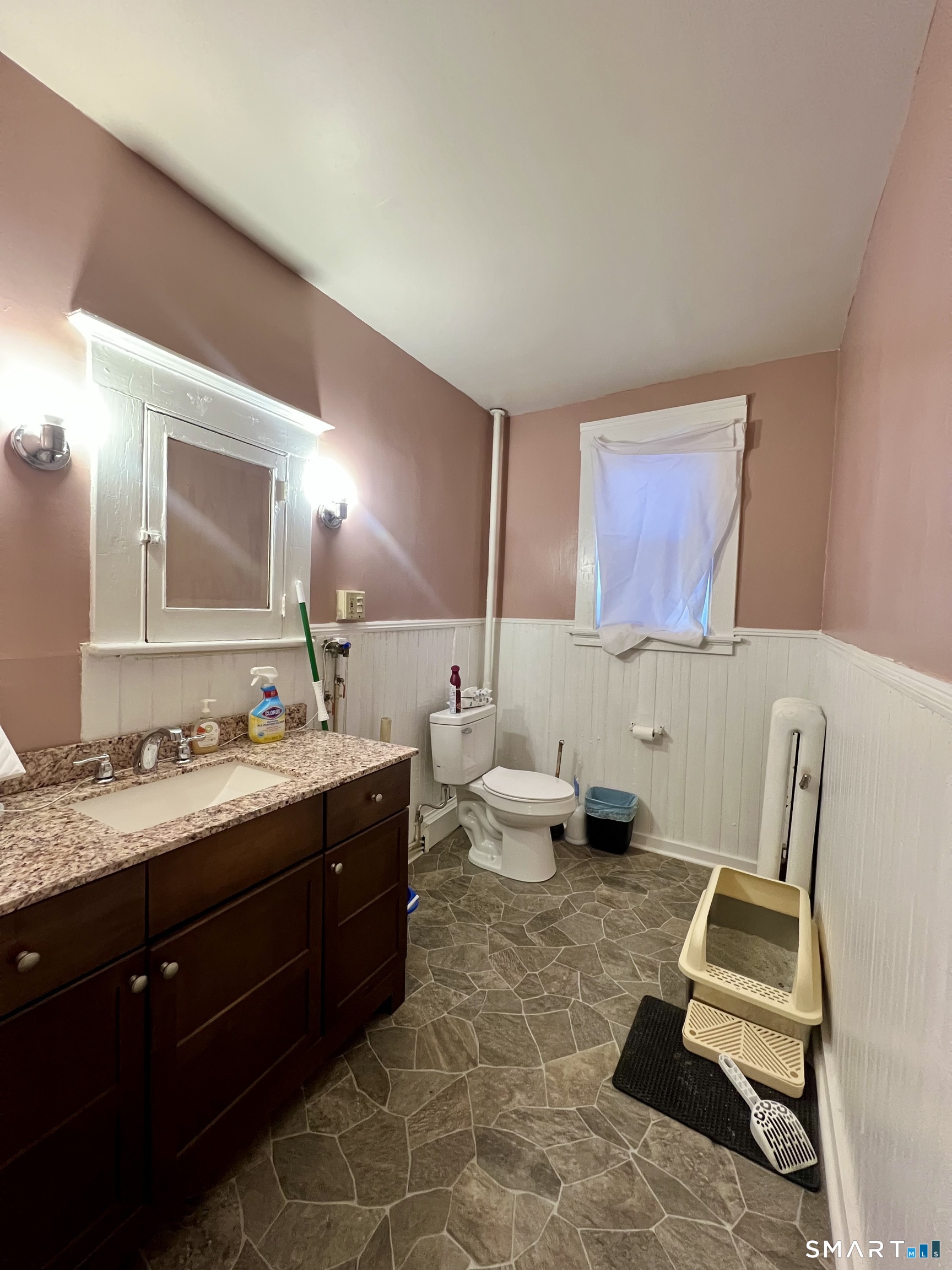 154 High Street Torrington, CT 06790 - Photo 23 of 36 a spacious bathroom with a double vanity sink toilet and mirror