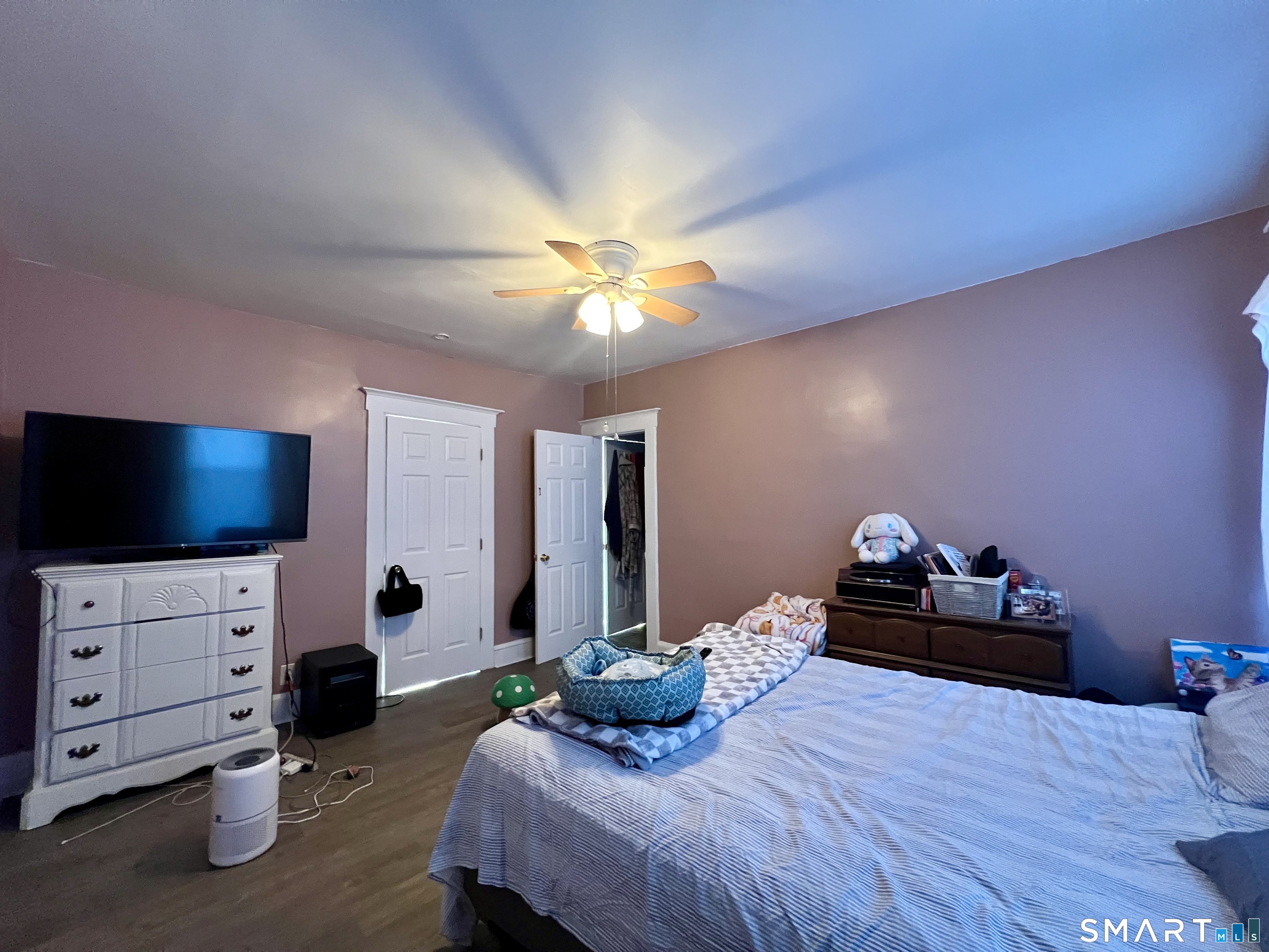 154 High Street Torrington, CT 06790 - Photo 24 of 36 a bedroom with furniture and a flat screen tv