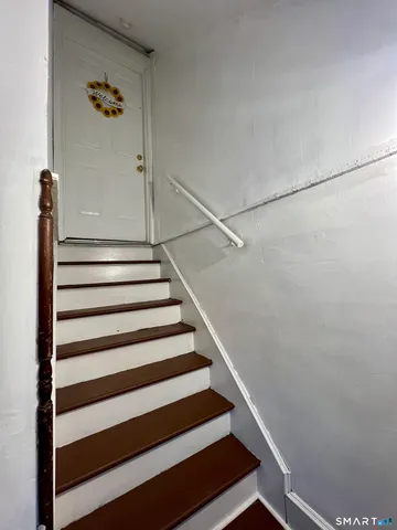 a kitchen that has a lot of cabinets in it
