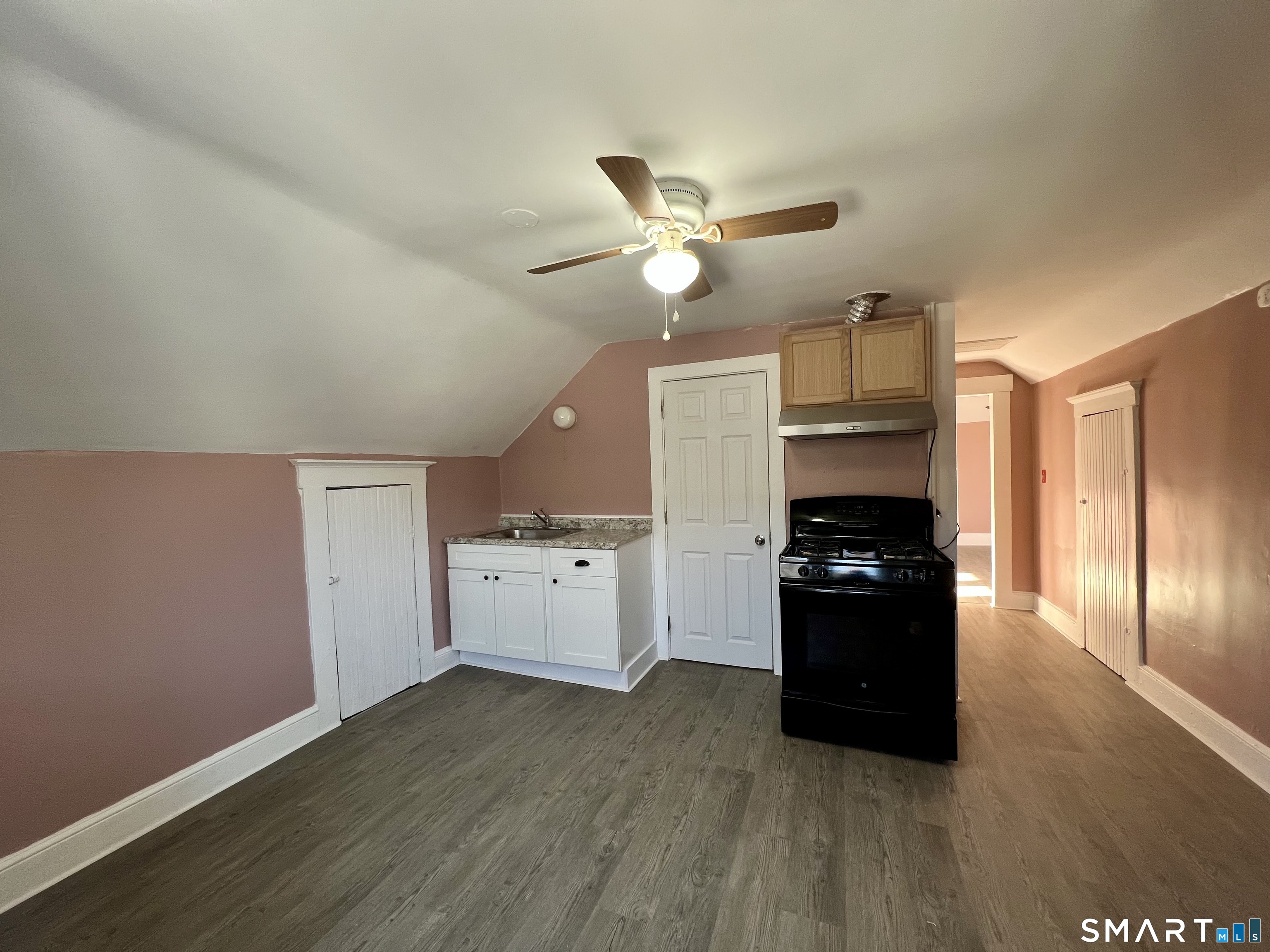 154 High Street Torrington, CT 06790 - Photo 30 of 36 a kitchen with granite countertop a refrigerator a stove a sink and dishwasher