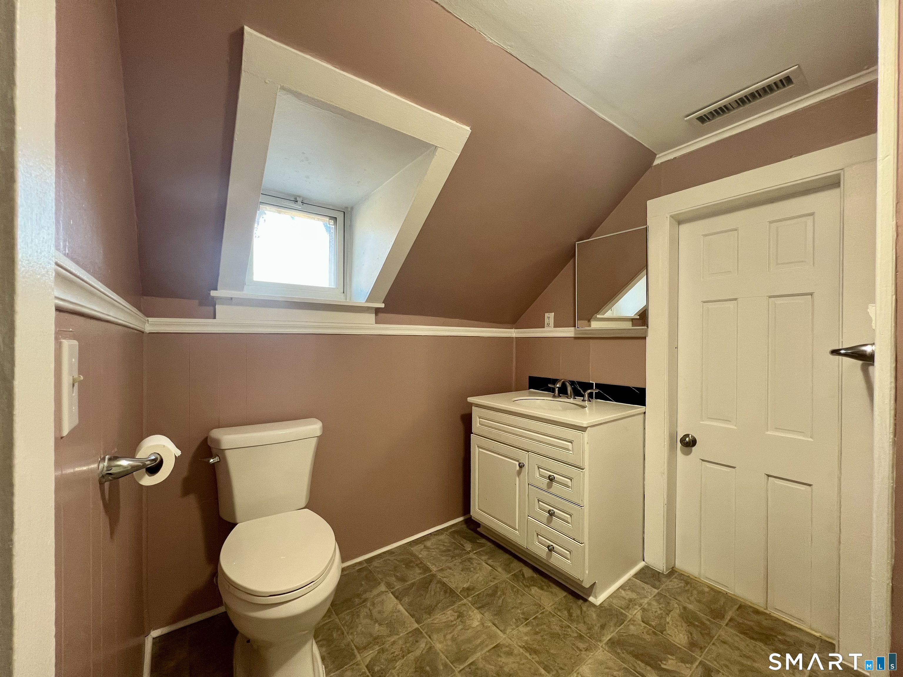 154 High Street Torrington, CT 06790 - Photo 32 of 36 a bathroom with a stove a sink and a toilet