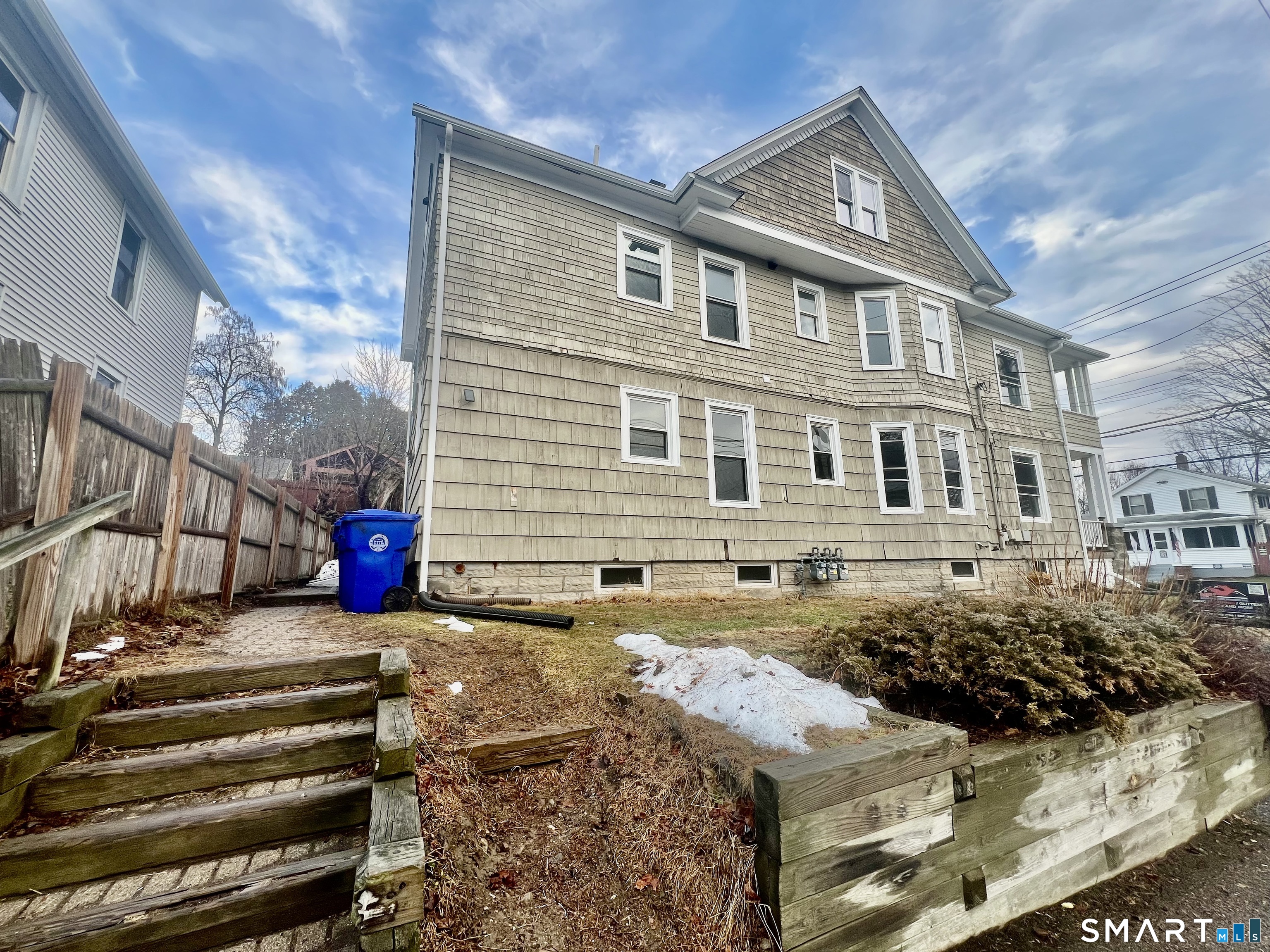 154 High Street Torrington, CT 06790 - Photo 6 of 36 a front view of a house with a yard