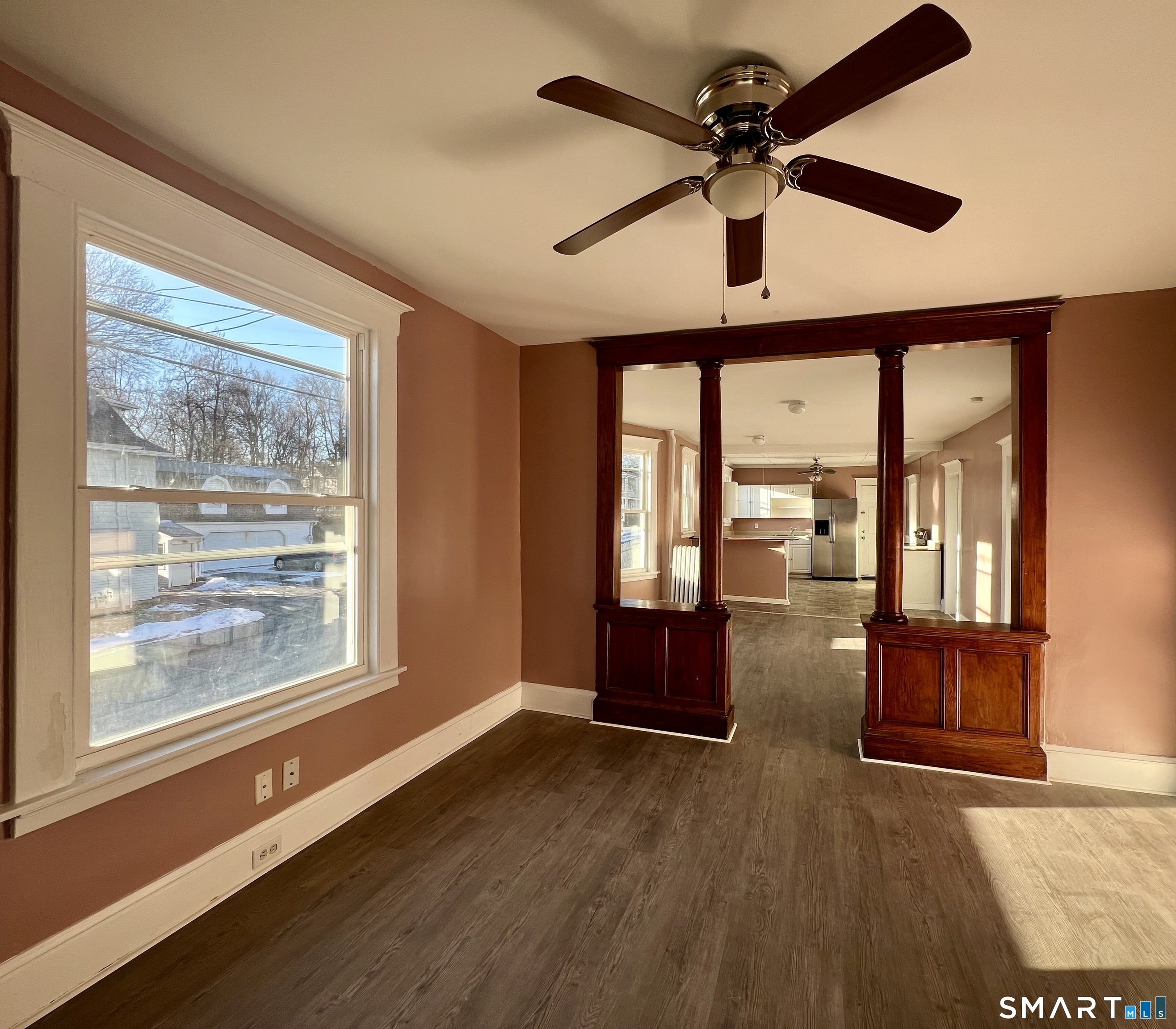 154 High Street Torrington, CT 06790 - Photo 8 of 36 a very nice looking room with wooden floor and windows