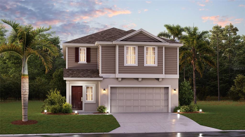 673 Reggie Road Winter Haven, FL 33859 - Photo 1 of 1 a front view of a house with a garden